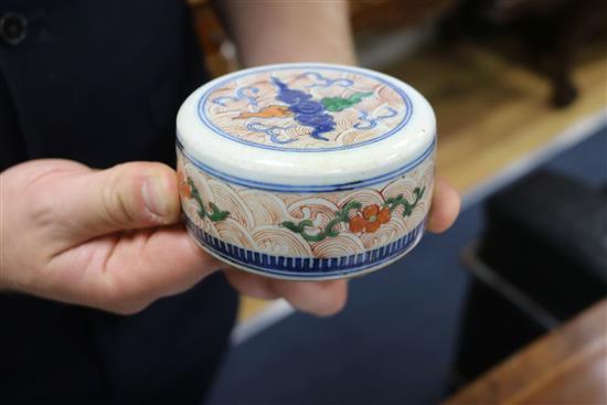 A Chinese doucai dragon ovoid jar and cover, Yongzheng four character mark but 19th century, height 24.5cm excl. wood stand